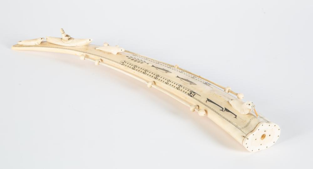 AN INUIT WALRUS CRIBBAGE BOARD