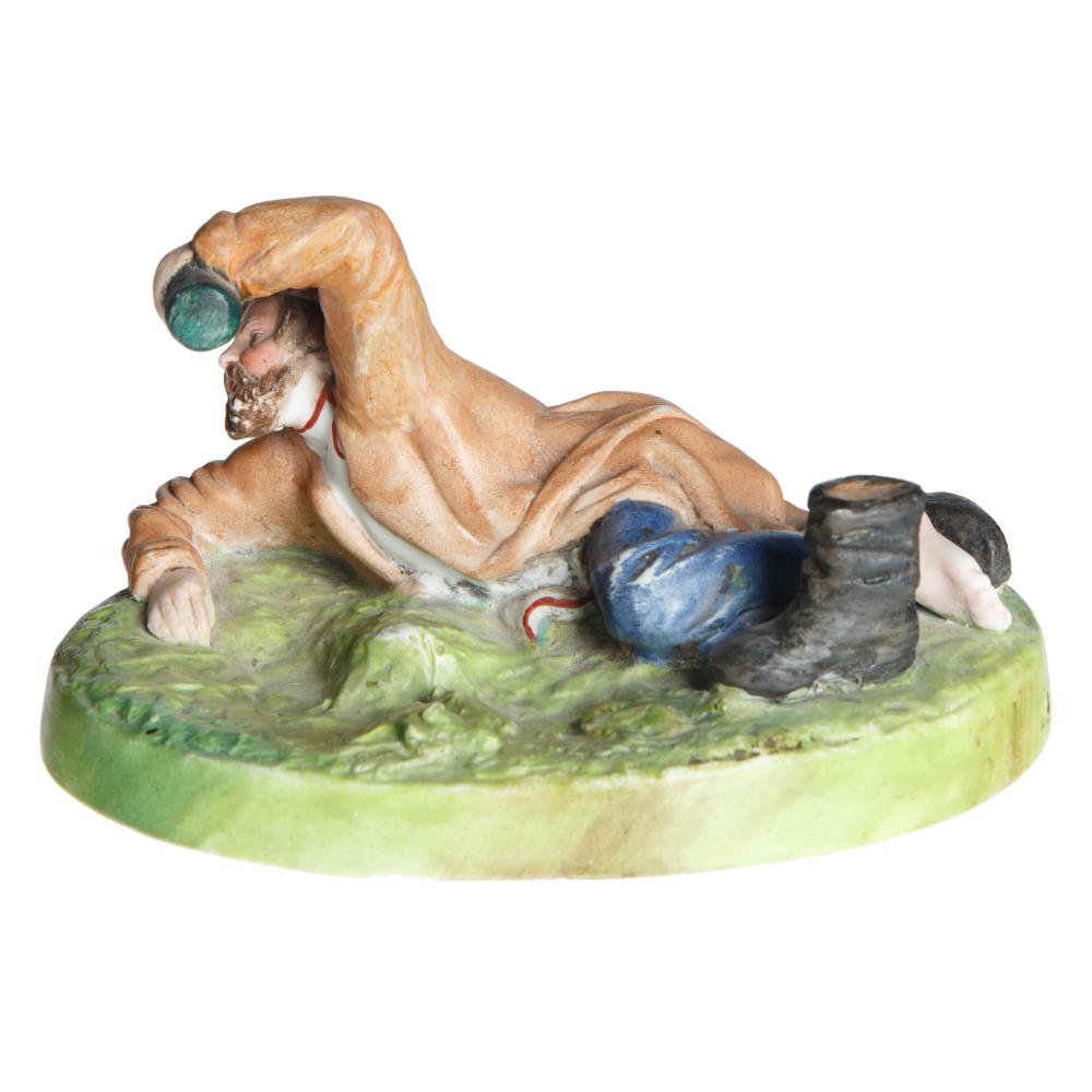 RUSSIAN PORCELAIN FIGURINE OF A DRUNK MAN, GARDNER PORCELAIN FACTORY (VERBILKI), MOSCOW, 1870-1890