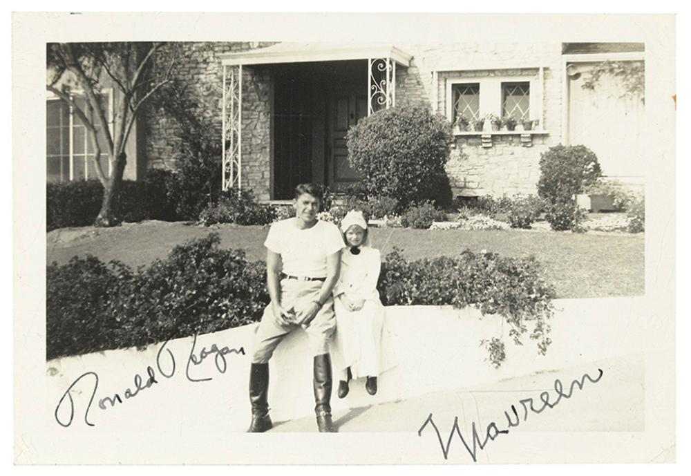 REAGAN, RONALD. Photograph Signed, full-length portrait of the young actor and his first daughter, Maureen,