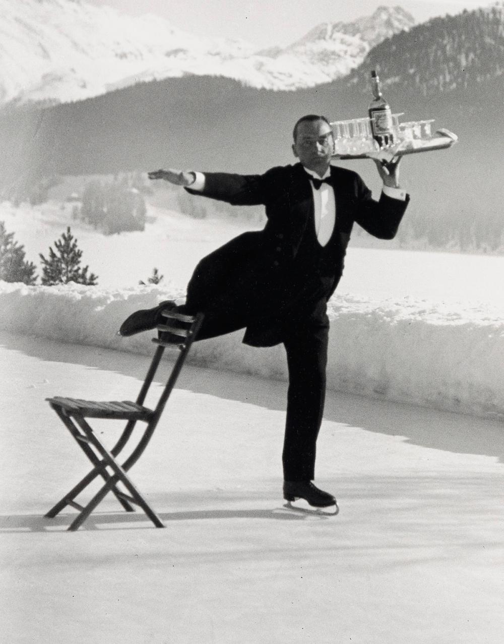 ALFRED EISENSTAEDT (1898-1995) Ice Skating Waiter, St. Moritz.
