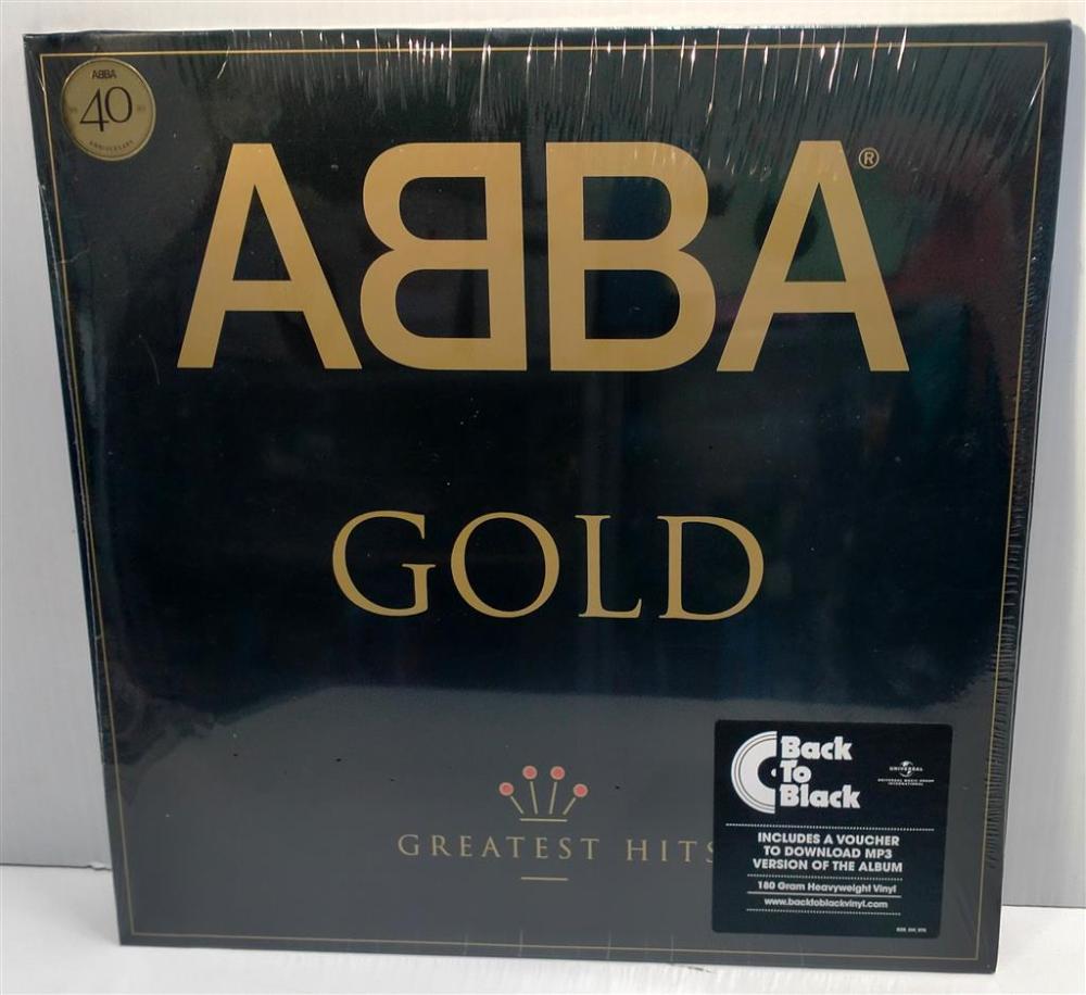 A record marked Abba Gold in sealed packaging