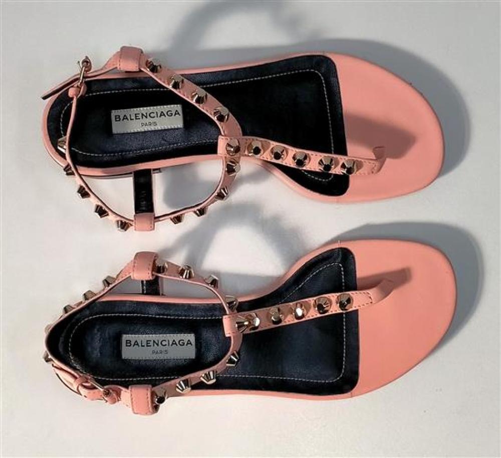 A pair of womens sandals ma... image