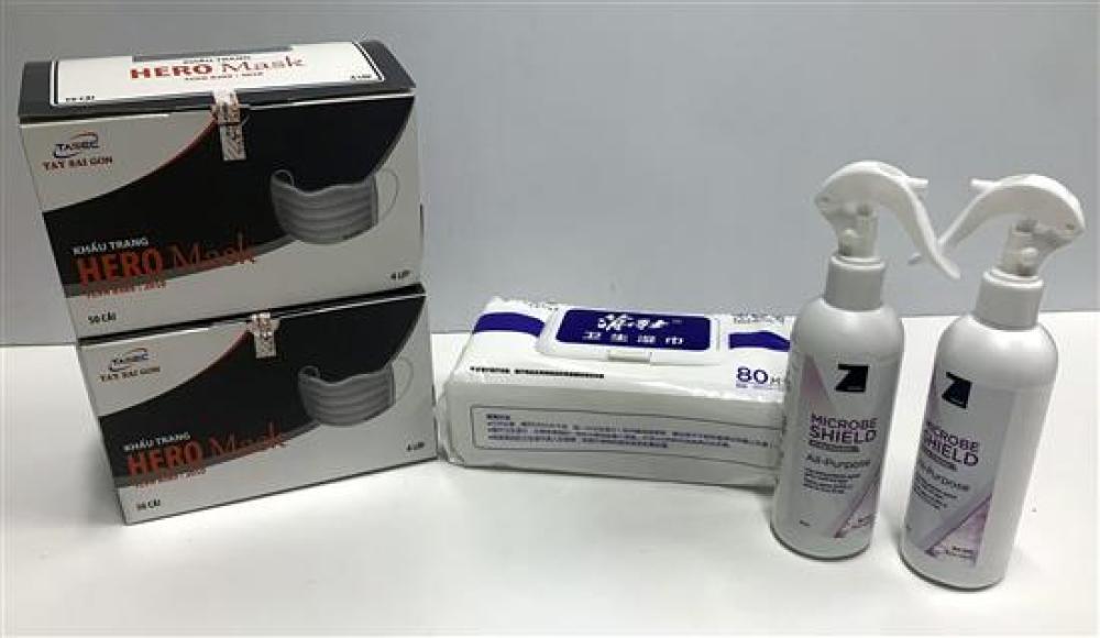 A box of assorted face mask... image