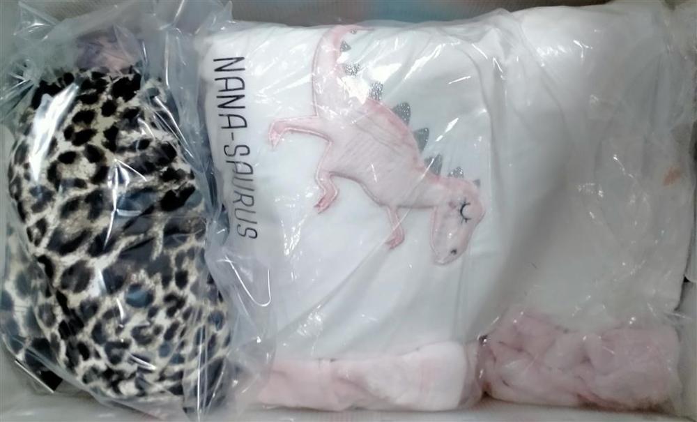 A box of assorted pyjamas, ... image