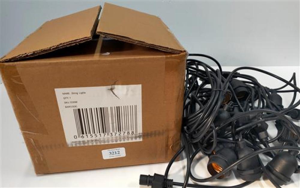 A boxed string light set, p... image