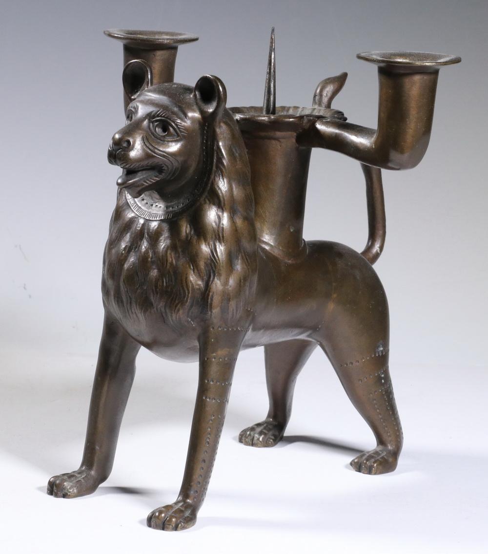 BRONZE LION FORM CANDLESTICK BY OTTO HAGEMANN