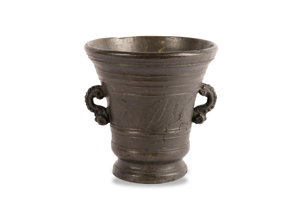 Mortar with relief decoration all around, Handle in the form of rocailles in relief