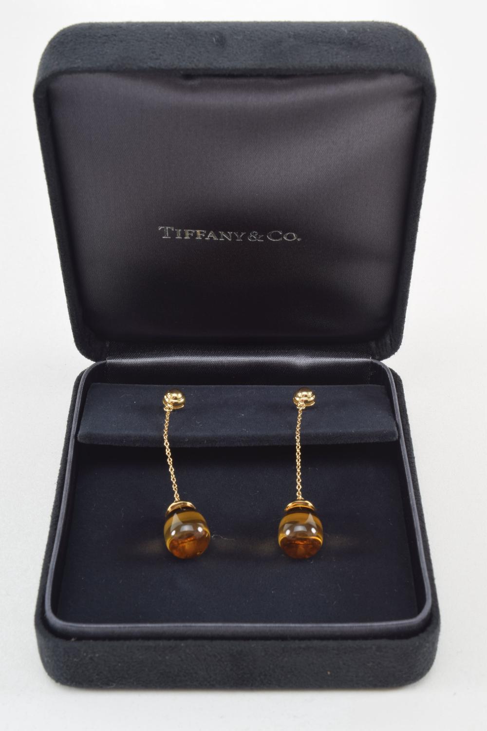 Pair of Tiffany & Co 18K ear pendants, amber stone and