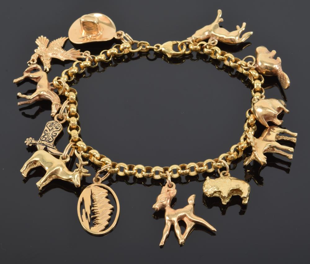 14K yellow gold charm brace... image