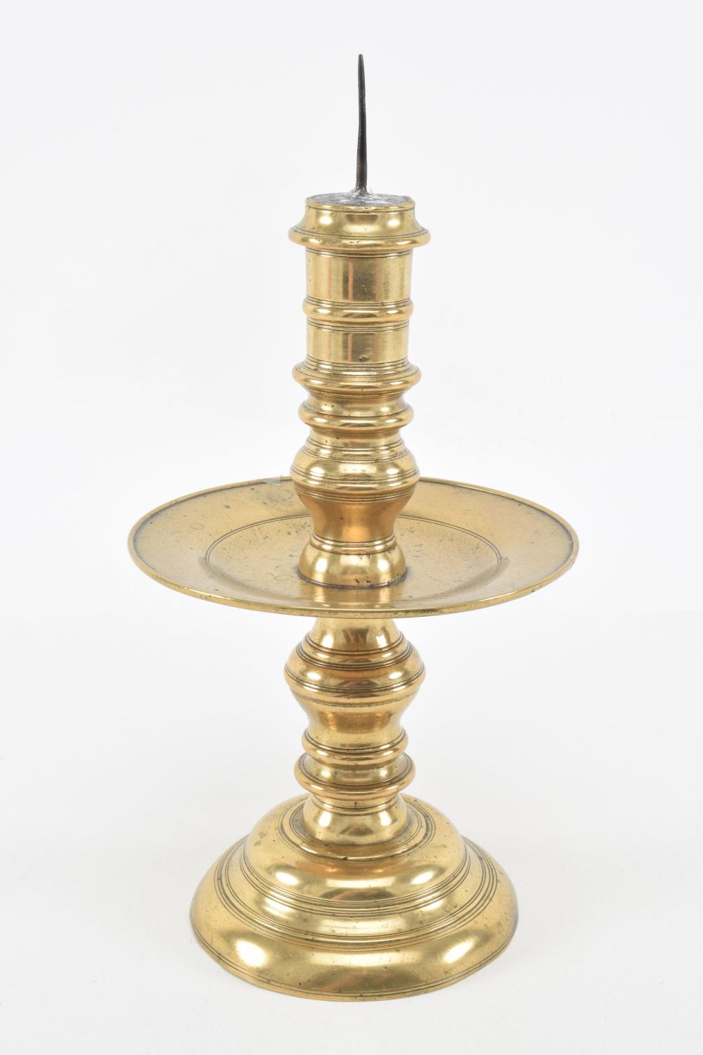 17th century bronze candlestick with dish and turned