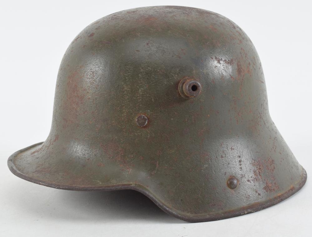 WWI German M16 Helmet with Complete Liner and Chin Strap. Stamped "S 60" there is a small H within