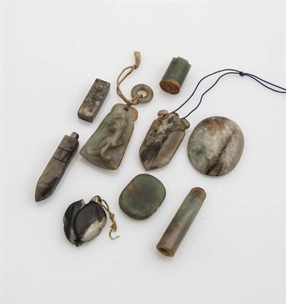 Nine Chinese Russet-Celadon and Black-White Jade Pendants and Carvings 18th-20th Century