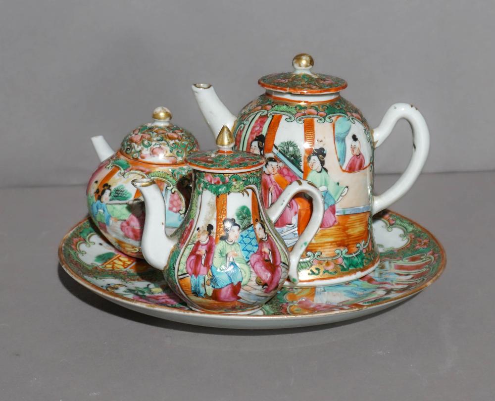 Three Chinese Export Rose Medallion Teapots or Wine Pots and a Dish, Last Half 19th Century, Height of Larger Teapot: 4 1/2 in. (11.4 cm.)